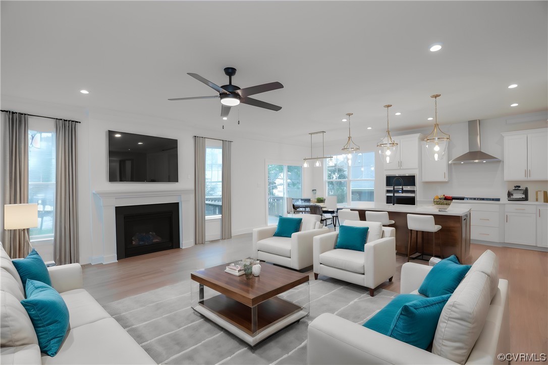 4357 Landfall Drive Williamsburg, VA 23185 - Photo 13 of 44 a living room with furniture fireplace and a flat screen tv