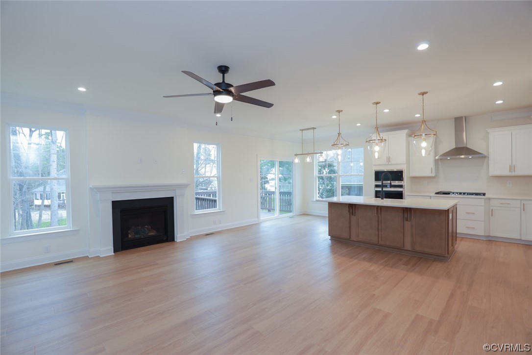 4357 Landfall Drive Williamsburg, VA 23185 - Photo 14 of 44 a view of kitchen with cabinets and wooden floor