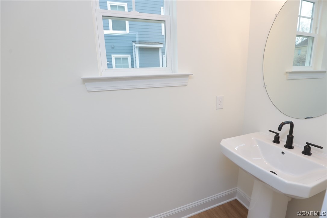 4357 Landfall Drive Williamsburg, VA 23185 - Photo 16 of 44 a bathroom with a sink and a mirror