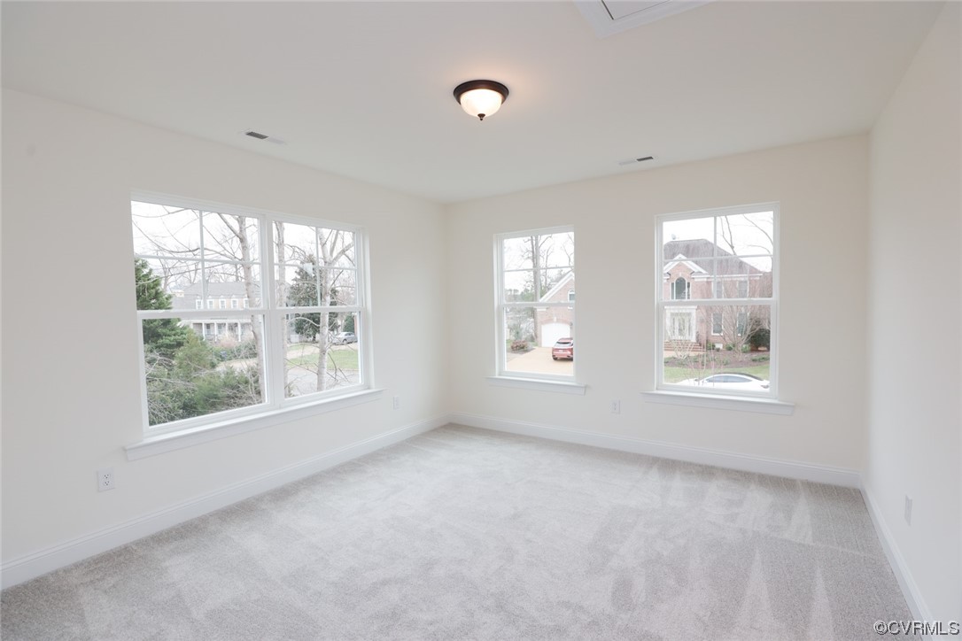 4357 Landfall Drive Williamsburg, VA 23185 - Photo 18 of 44 a view of an empty room with a window
