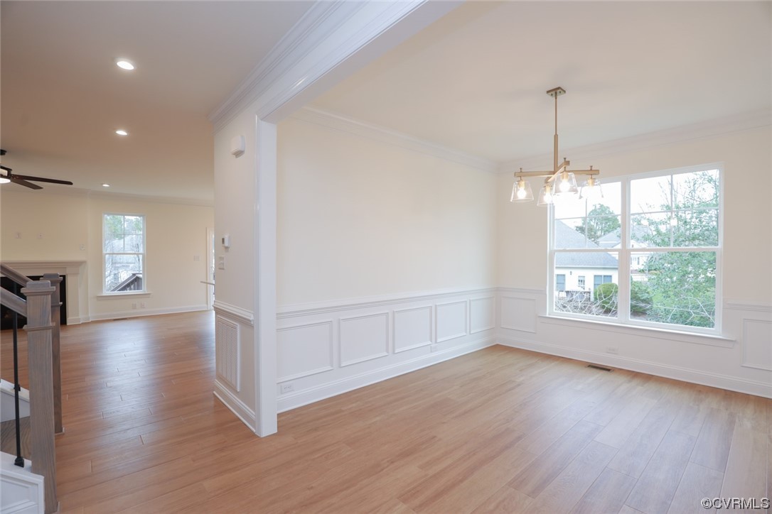 4357 Landfall Drive Williamsburg, VA 23185 - Photo 6 of 44 a view of an empty room with wooden floor and a window