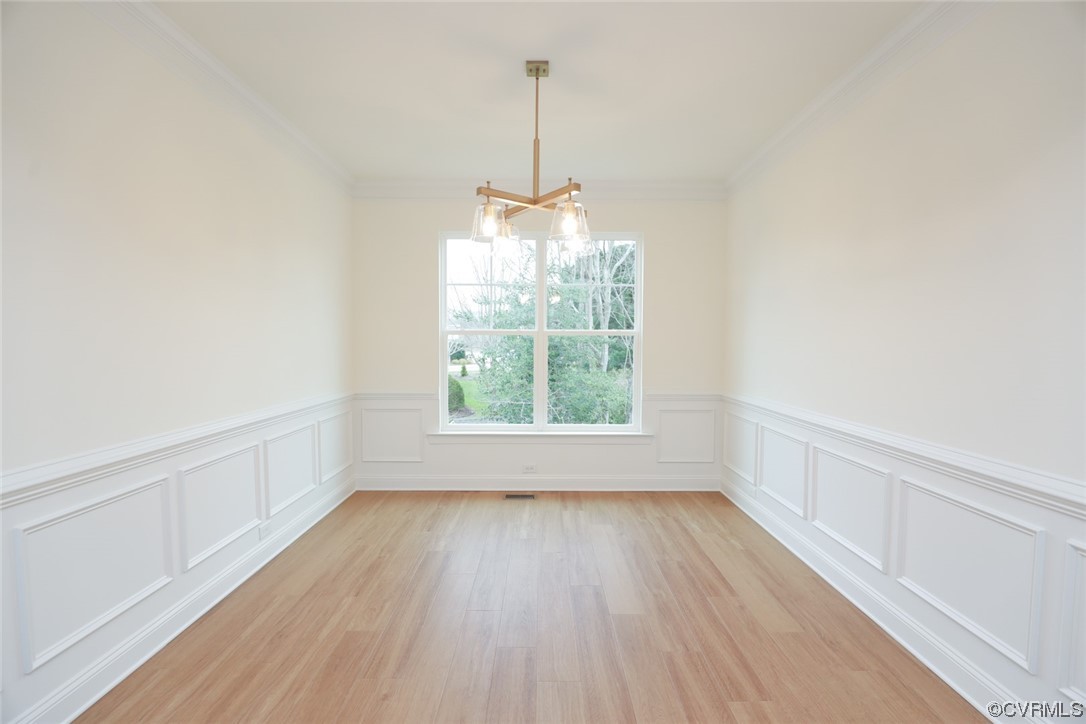 4357 Landfall Drive Williamsburg, VA 23185 - Photo 7 of 44 a view of a room with wooden floor a ceiling fan and window