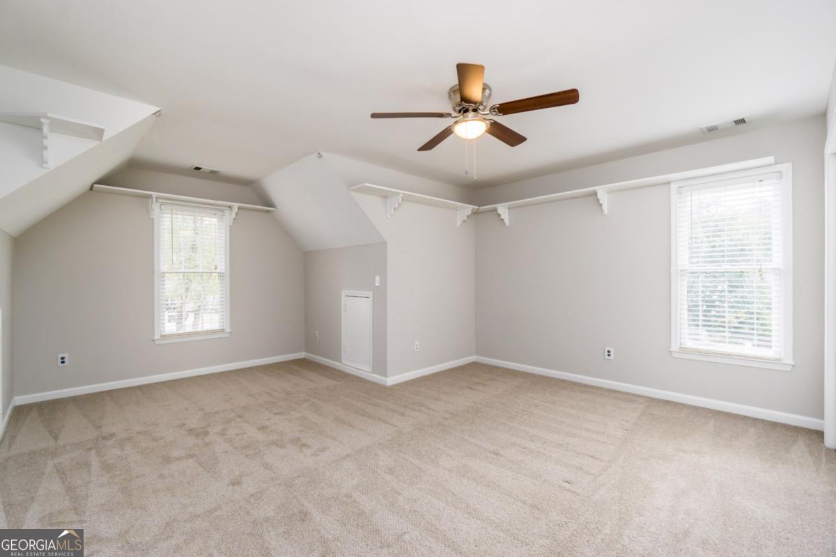 6710 Timber Cove Pointe Cumming, GA 30041 - Photo 33 of 51 a view of an empty room with a window