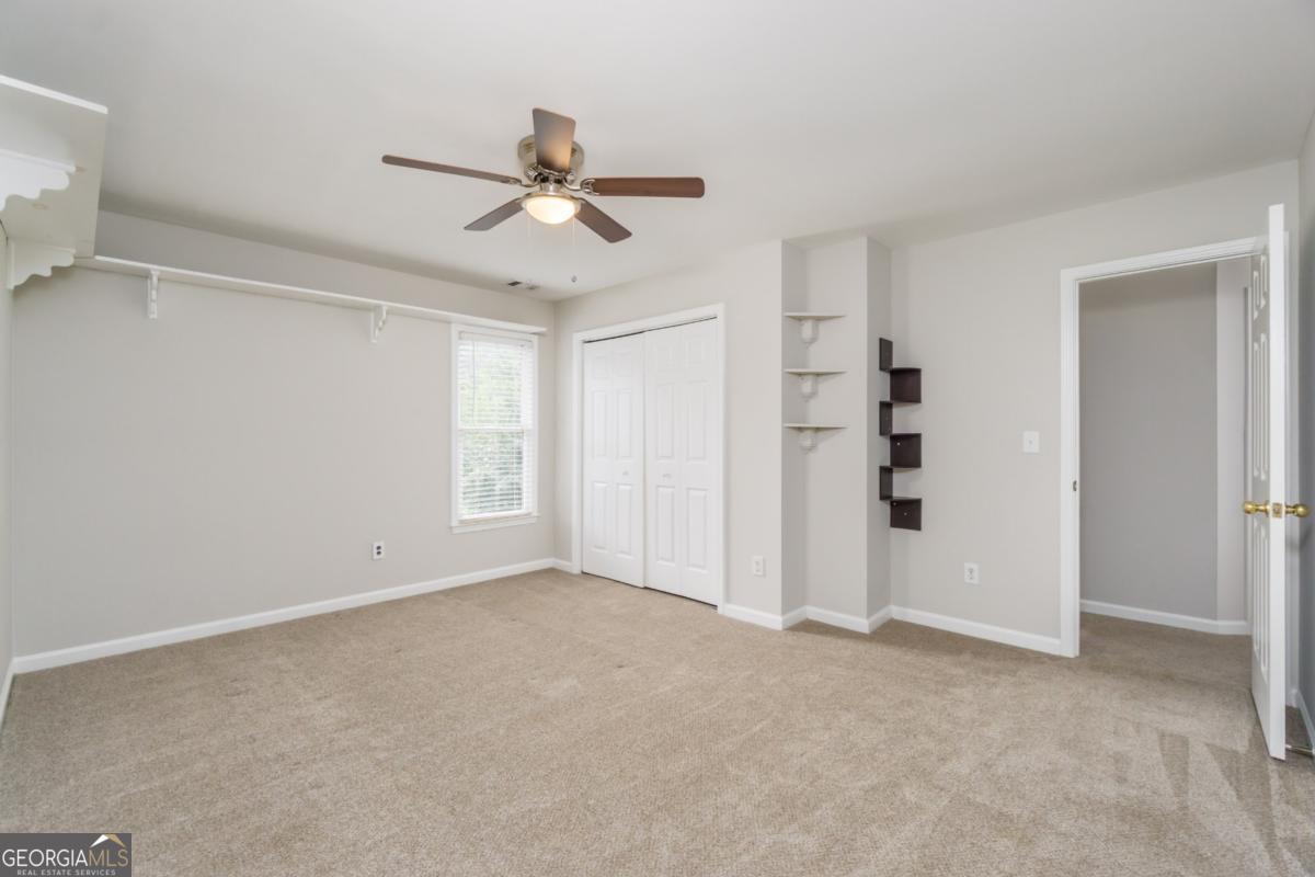 6710 Timber Cove Pointe Cumming, GA 30041 - Photo 34 of 51 a view of an empty room with a window