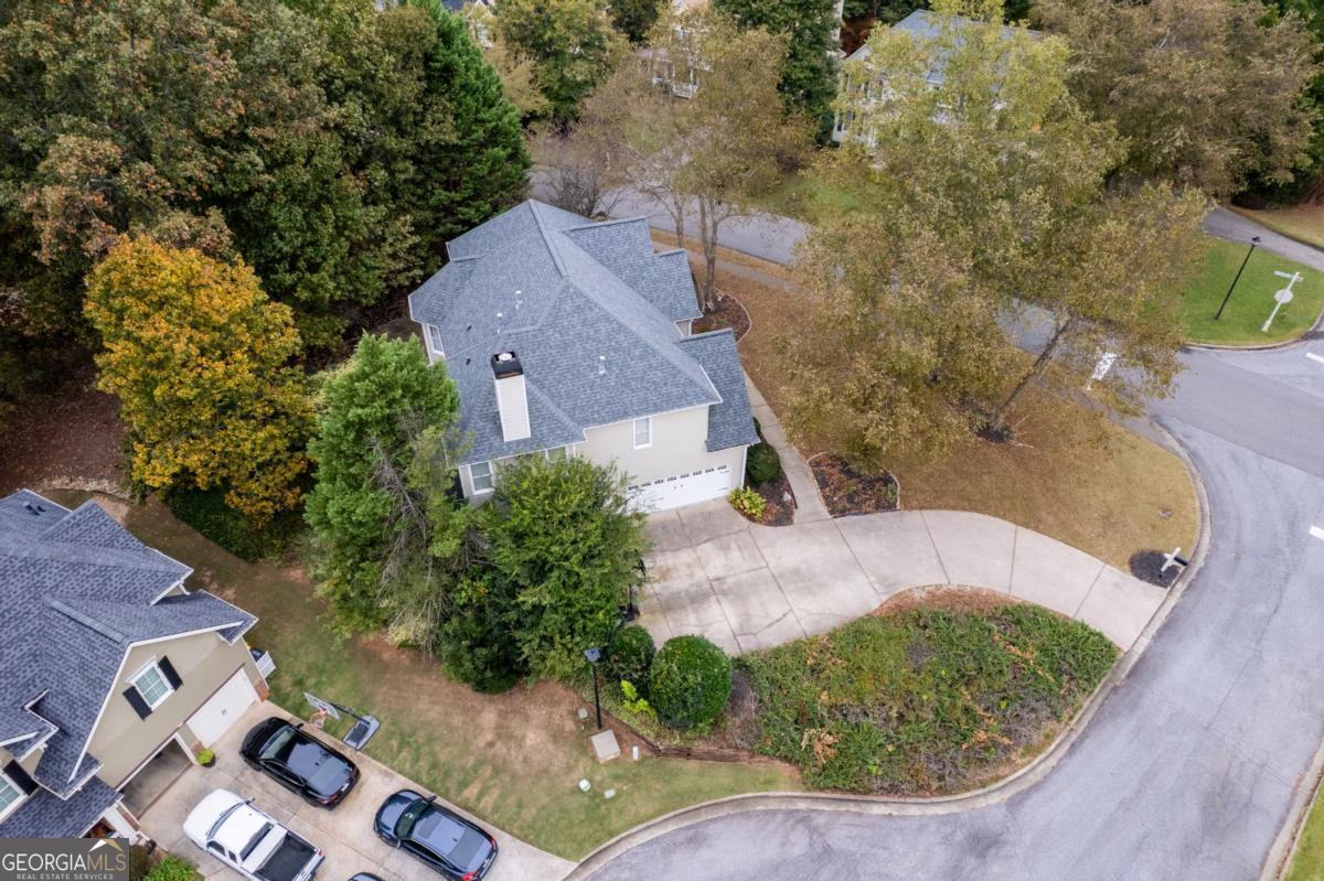 6710 Timber Cove Pointe Cumming, GA 30041 - Photo 41 of 51 an aerial view of a house with a yard