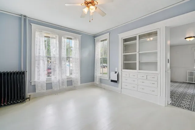 an empty room with windows