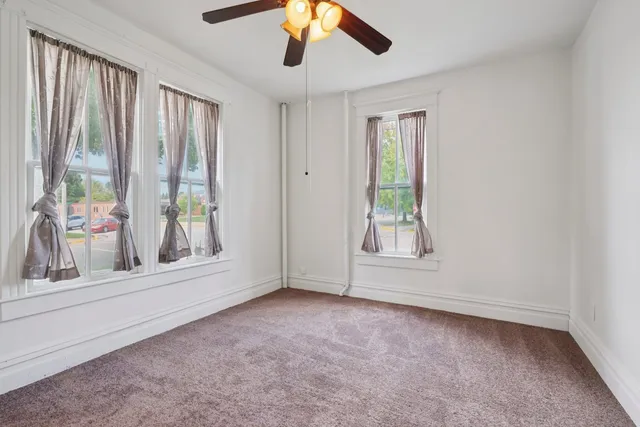 a view of a room with racks on the wall