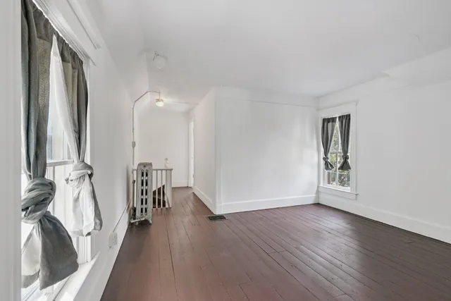 an empty room with windows