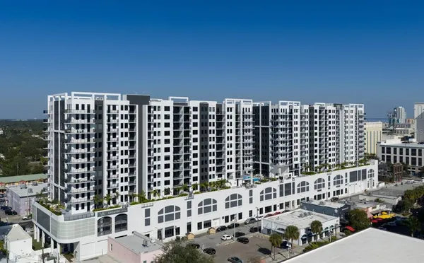 a view of a city with tall buildings