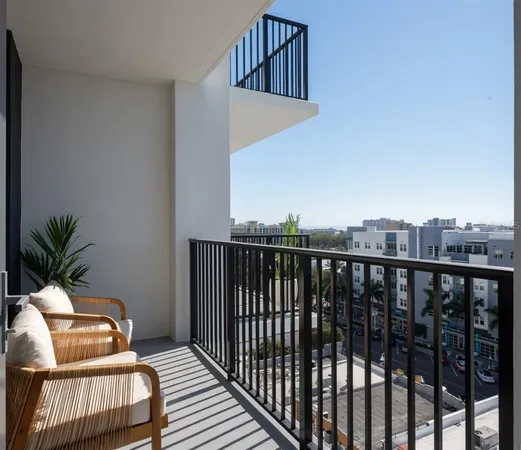 a view of balcony with wooden floor