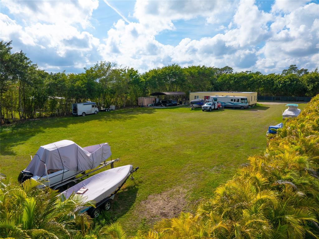 23600 Southwest 125th Avenue Homestead, FL 33032 - Photo 16 of 18 a garden view with a seating space
