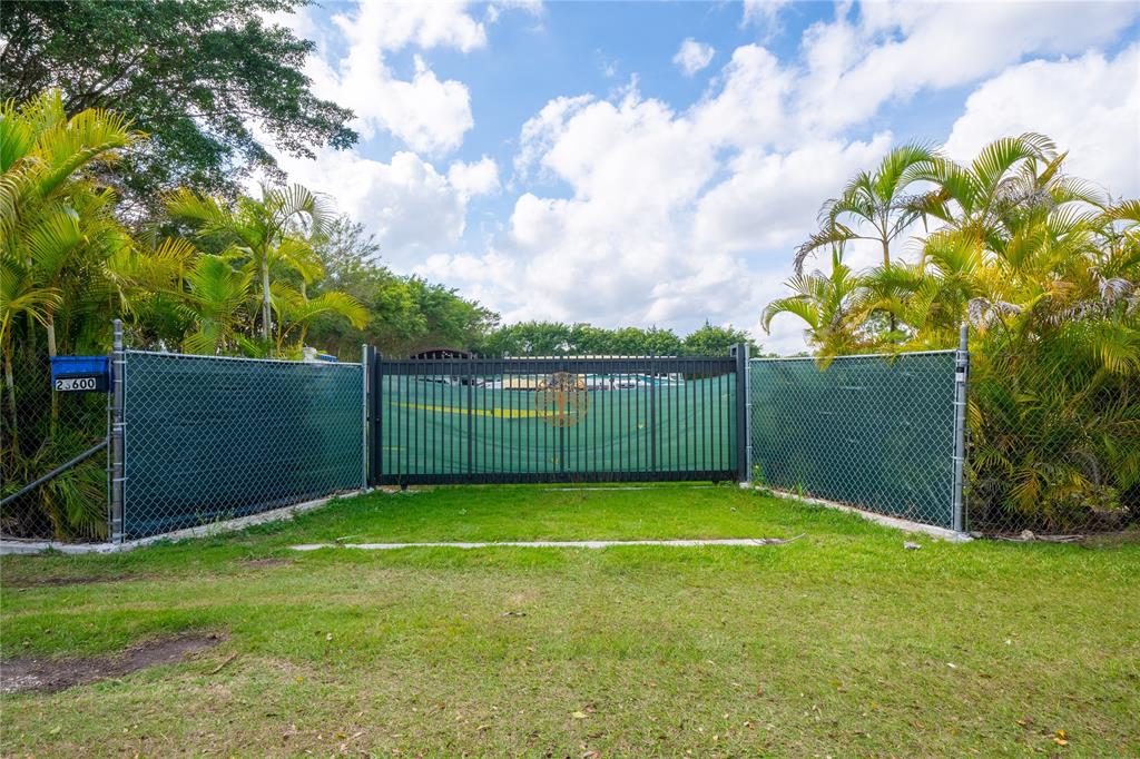 23600 Southwest 125th Avenue Homestead, FL 33032 - Photo 18 of 18 a view of a backyard with a tree