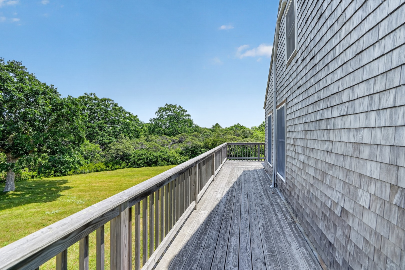 28 Black Point Road Chilmark, MA 02535 - Photo 39 of 56 Deck wraps around the whole house.