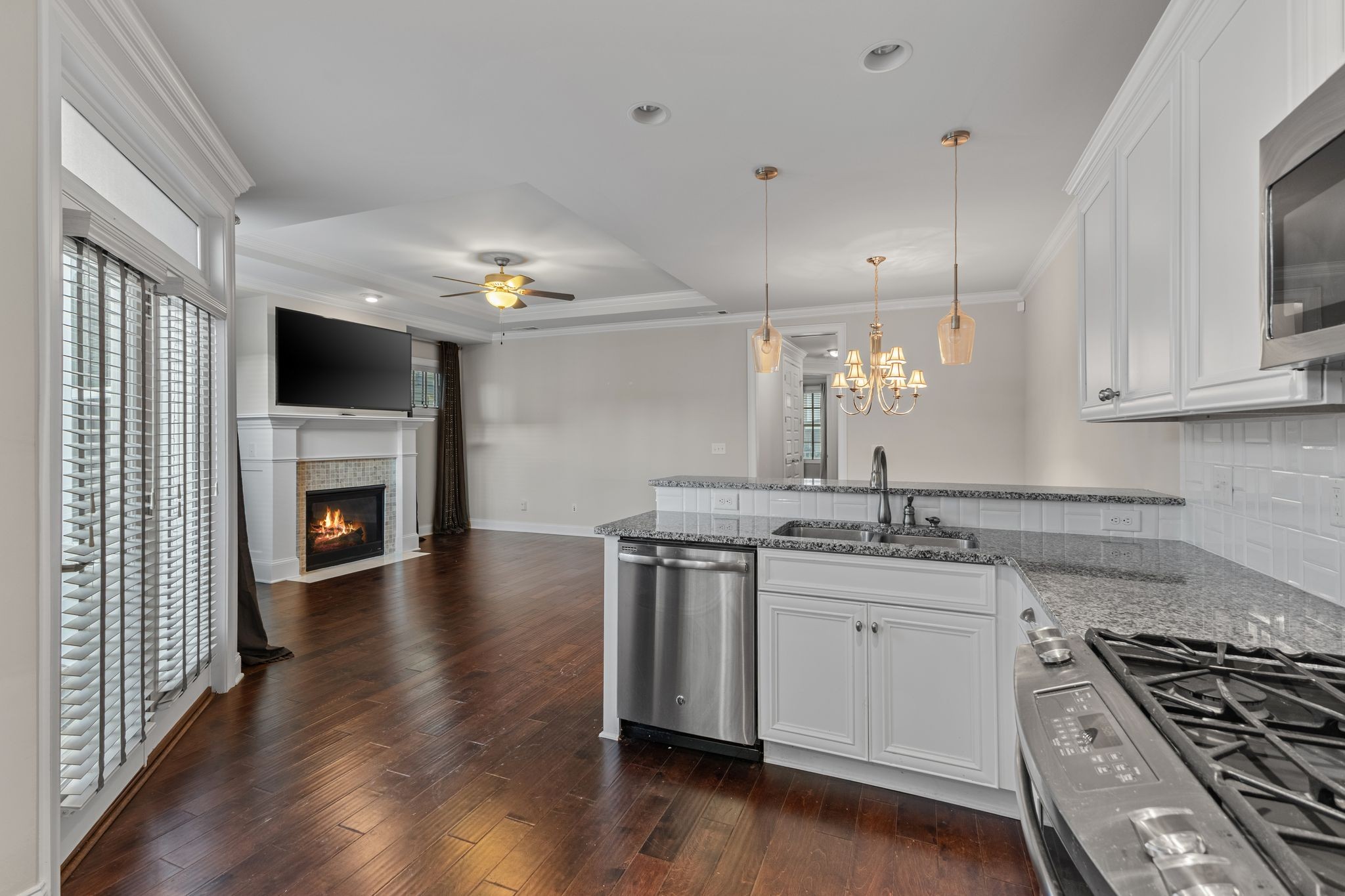 5102 Donovan Street Franklin, TN 37064 - Photo 18 of 45 a kitchen with a stove sink and cabinets