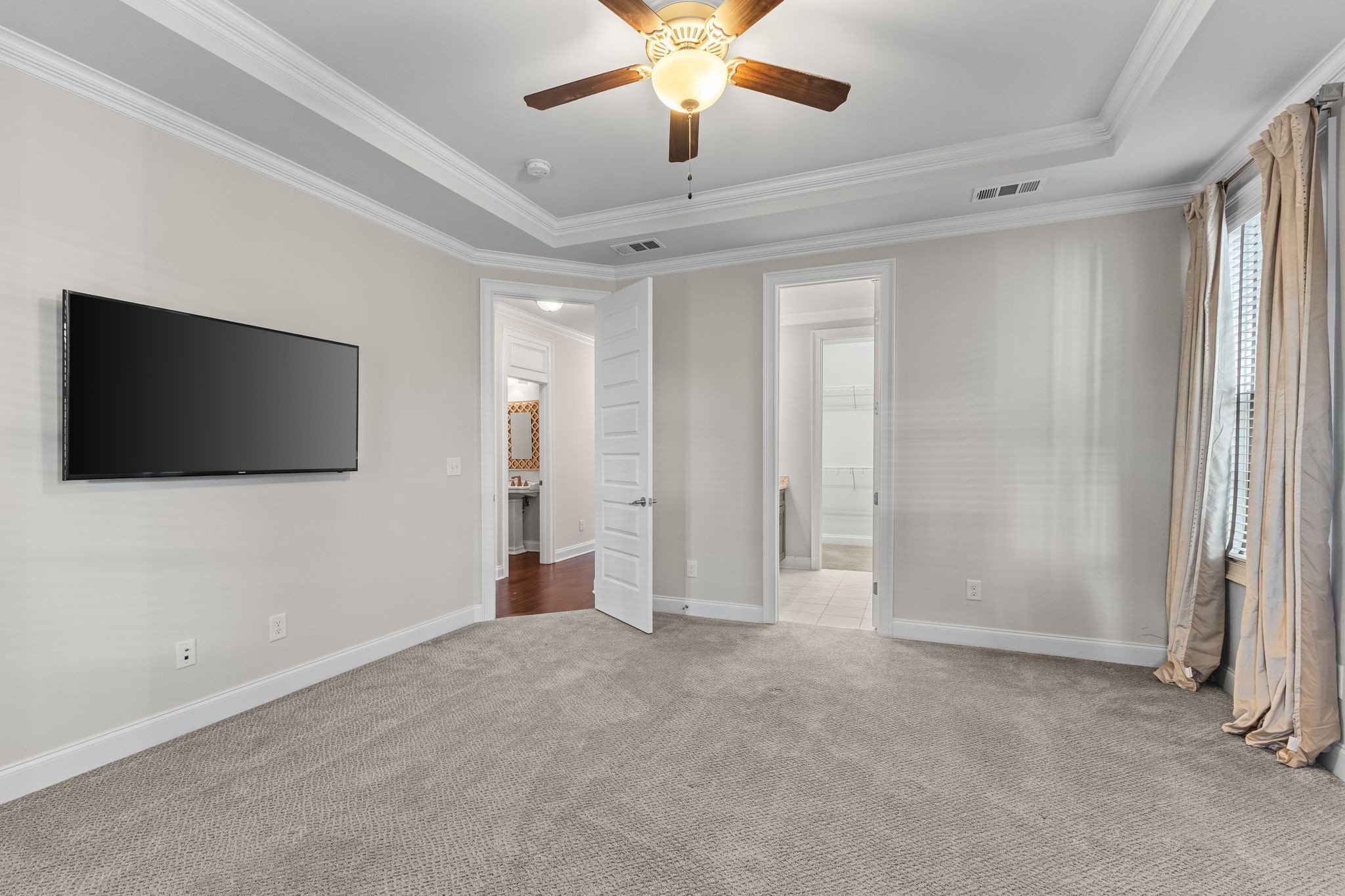 5102 Donovan Street Franklin, TN 37064 - Photo 20 of 45 a view of a livingroom with an empty space & a ceiling fan
