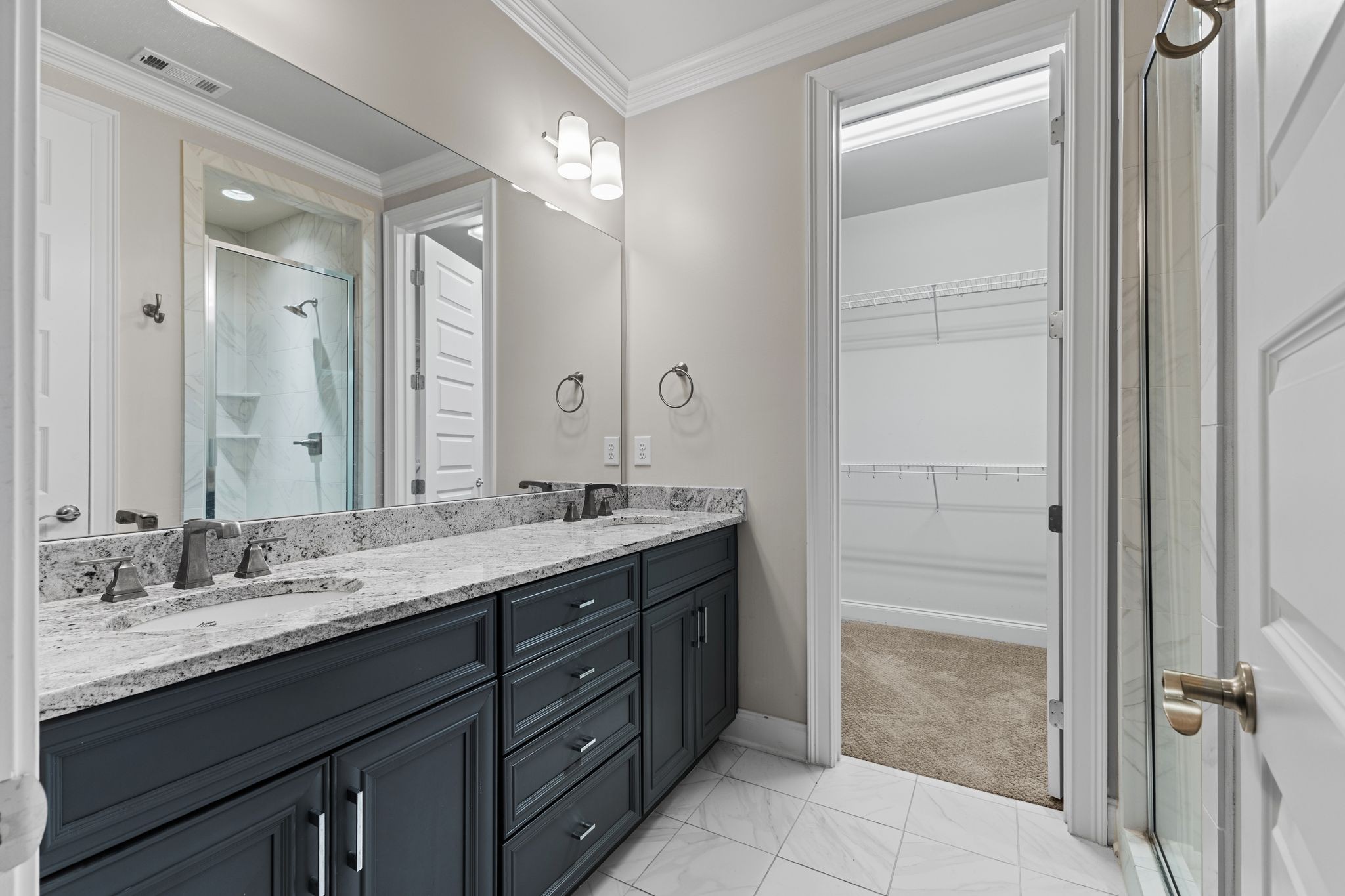 5102 Donovan Street Franklin, TN 37064 - Photo 21 of 45 a bathroom with a granite countertop sink mirror and double