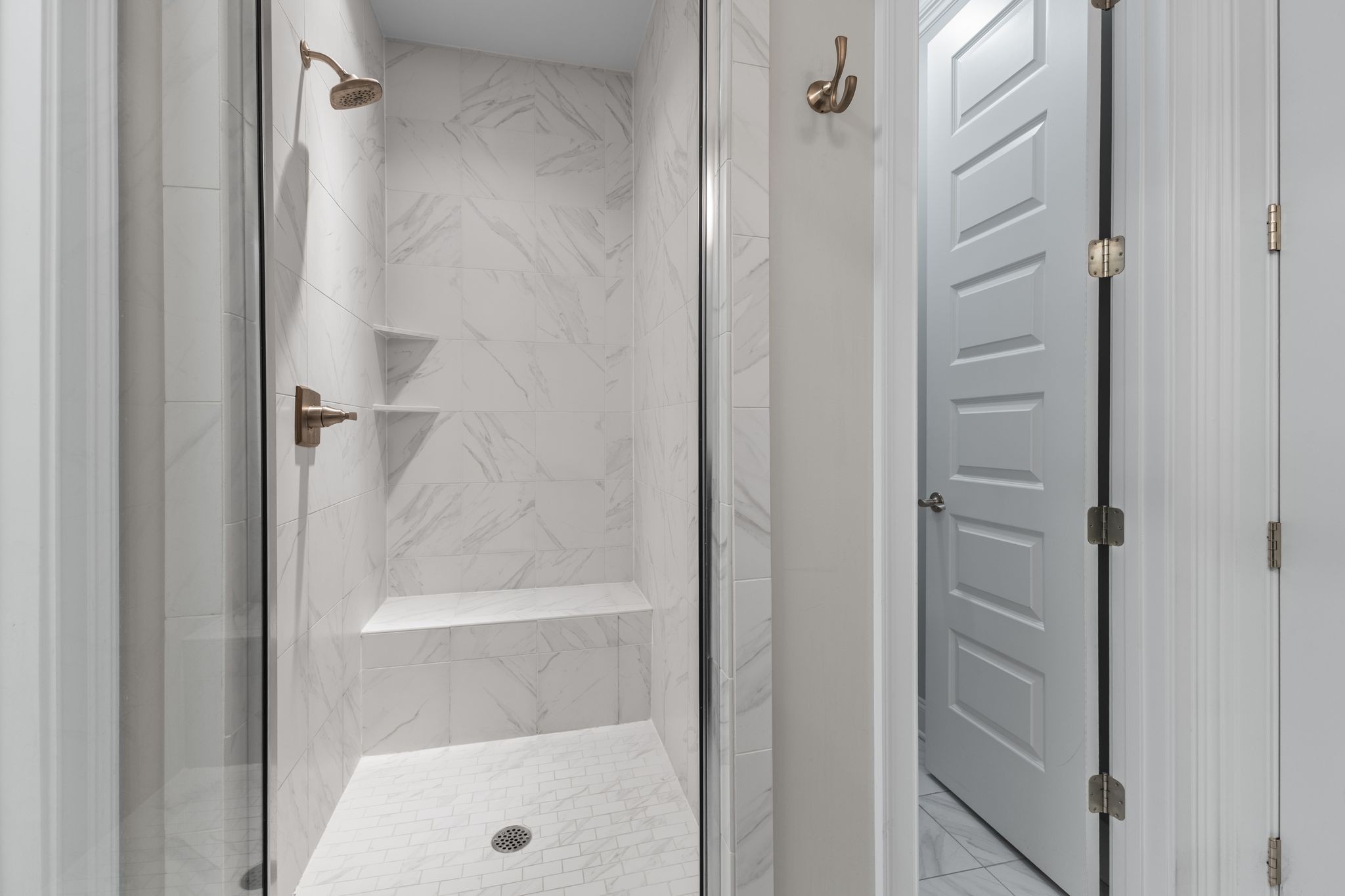 5102 Donovan Street Franklin, TN 37064 - Photo 22 of 45 a bathroom with a glass shower door