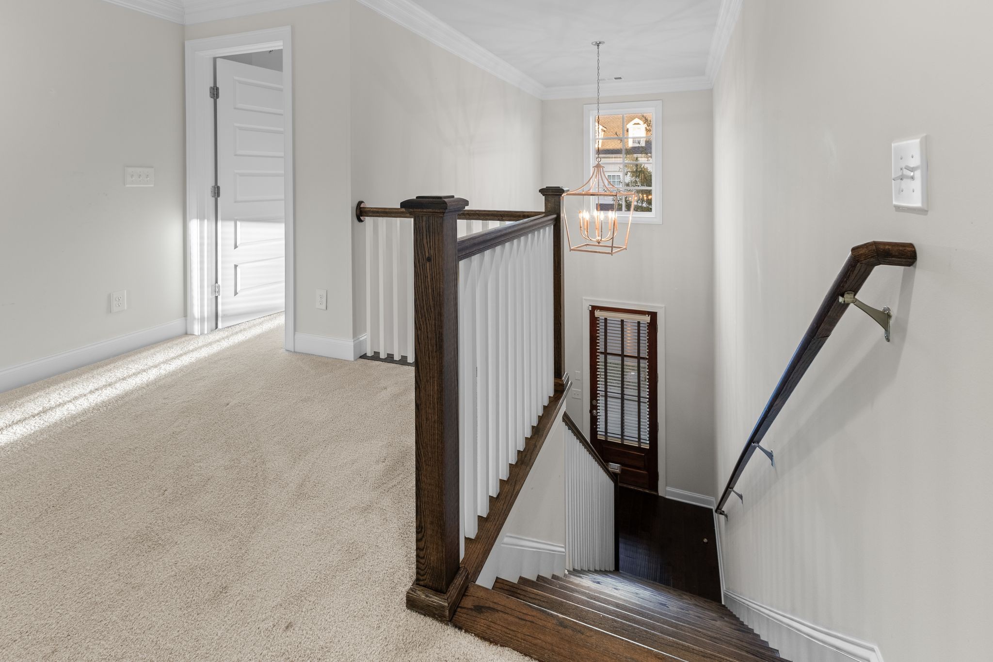5102 Donovan Street Franklin, TN 37064 - Photo 27 of 45 a view of a hallway with wooden floor and staircase
