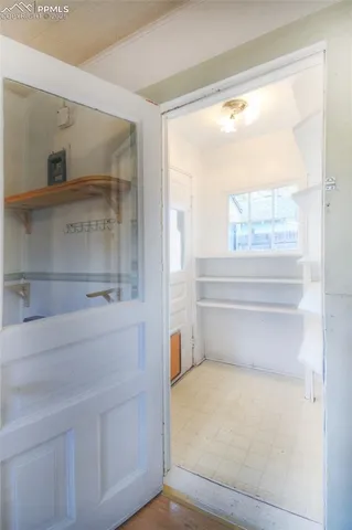 a view of a room that has a window