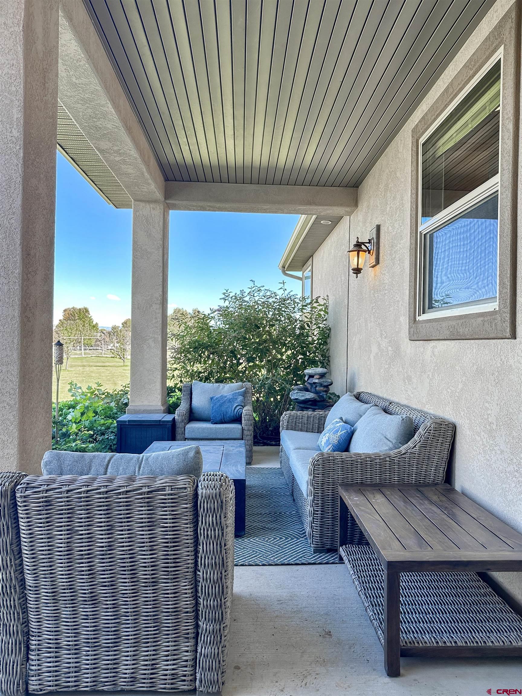 424 Shilo Court Delta, CO 81416 - Photo 33 of 45 a outdoor living space with patio furniture and garden