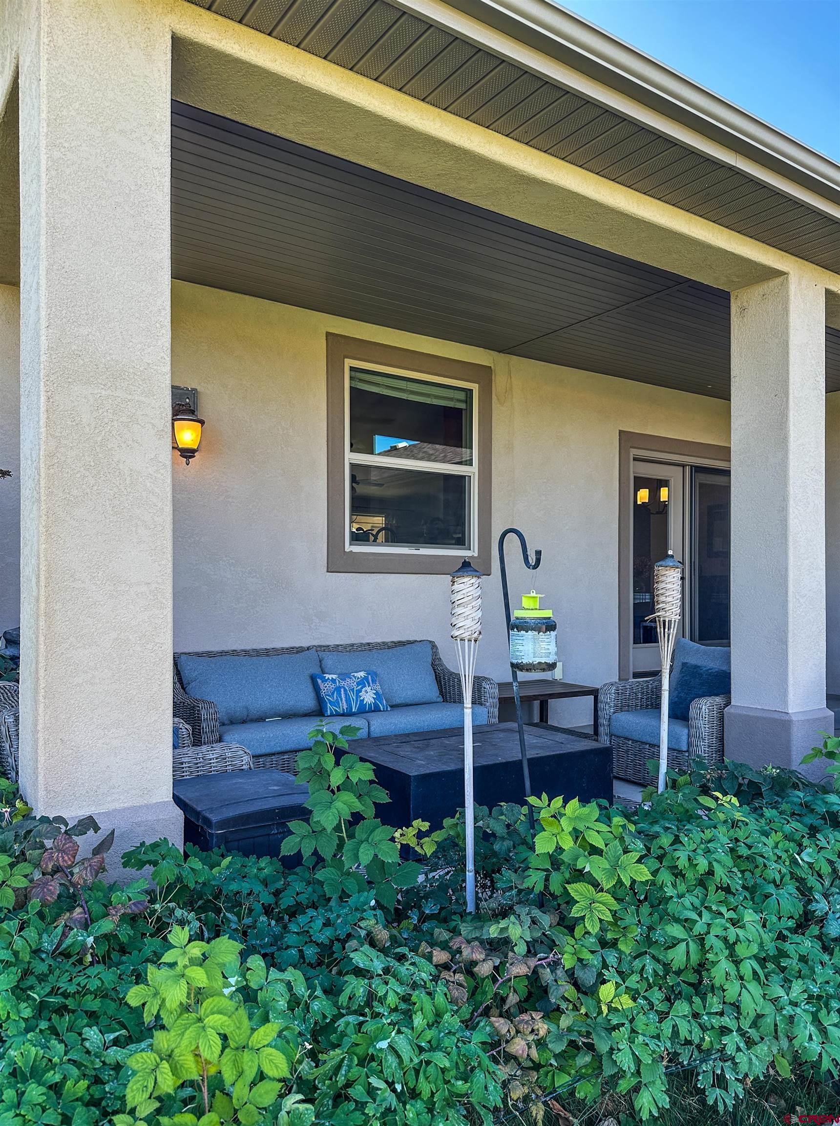 424 Shilo Court Delta, CO 81416 - Photo 35 of 45 a front view of a house with a yard