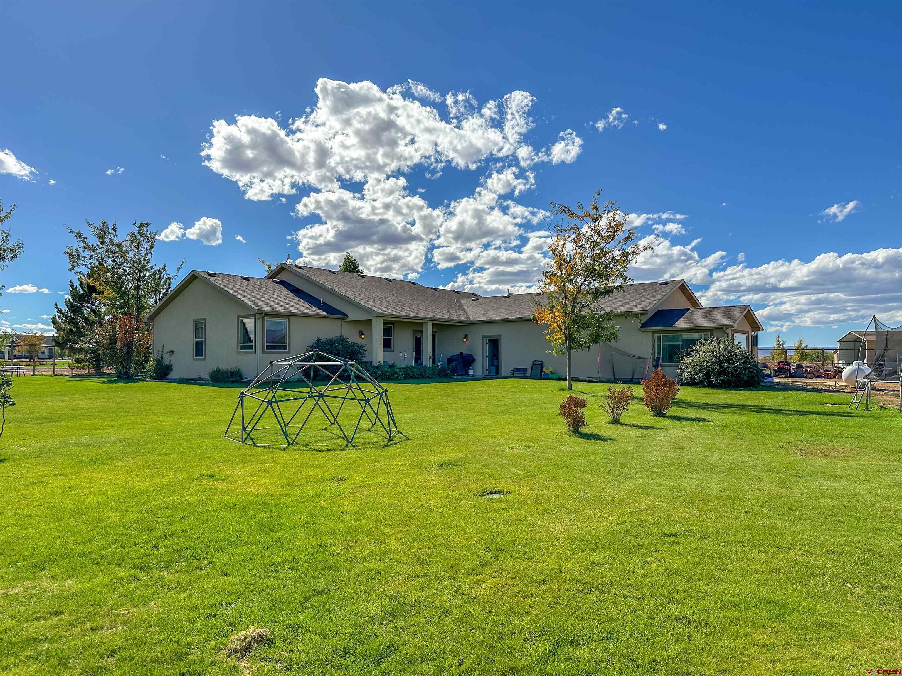 424 Shilo Court Delta, CO 81416 - Photo 39 of 45 a view of a house with a big yard