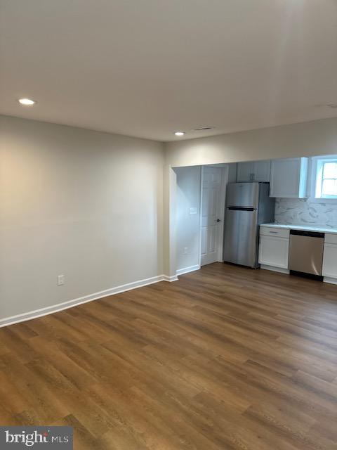 1004 South Cameron Street Winchester, VA 22601 - Photo 19 of 26 a view of empty room with wooden floor and window