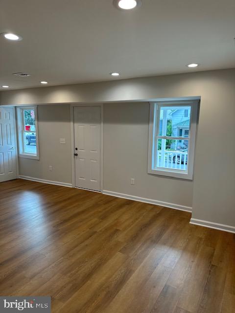 1004 South Cameron Street Winchester, VA 22601 - Photo 23 of 26 an empty room with wooden floor and windows