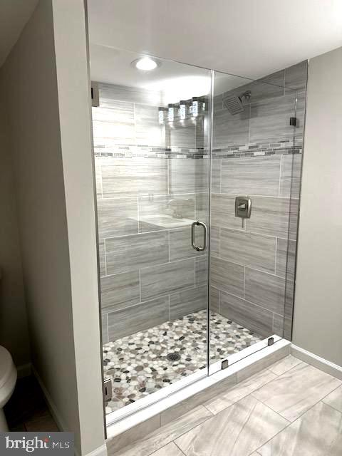 1004 South Cameron Street Winchester, VA 22601 - Photo 4 of 26 a bathroom with a shower