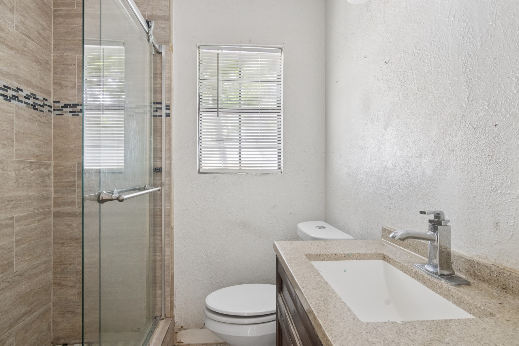 1002 Grenfell Lane Houston, TX 77076 - Photo 16 of 20 Full Bath with Walk-in Shower