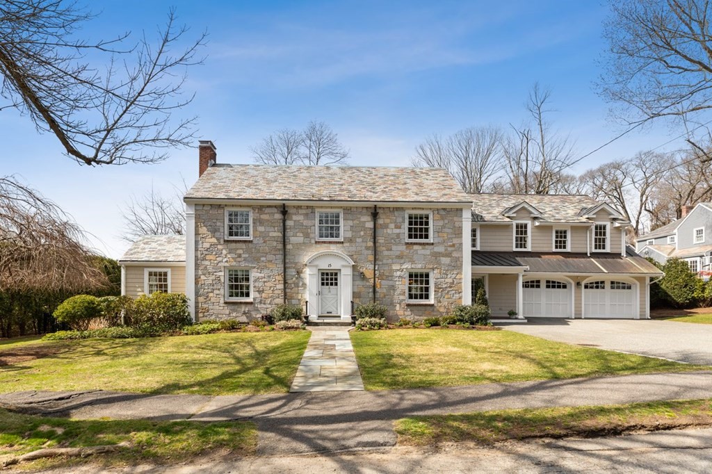 15 Gould Road Newton, MA 02468 - Photo 1 of 33 a front view of a residential apartment building with a yard