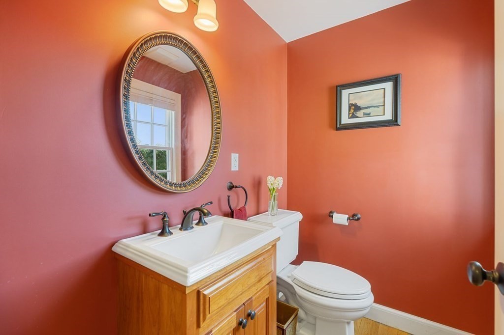 15 Gould Road Newton, MA 02468 - Photo 15 of 33 a bathroom with a sink and a mirror