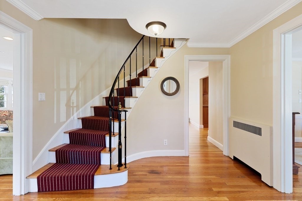 15 Gould Road Newton, MA 02468 - Photo 16 of 33 a view of entryway and hall with wooden floor