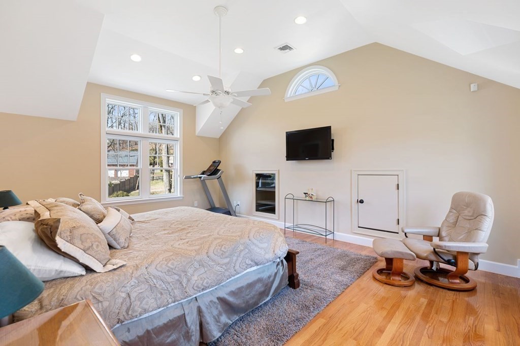 15 Gould Road Newton, MA 02468 - Photo 17 of 33 a bedroom with furniture and a flat screen tv