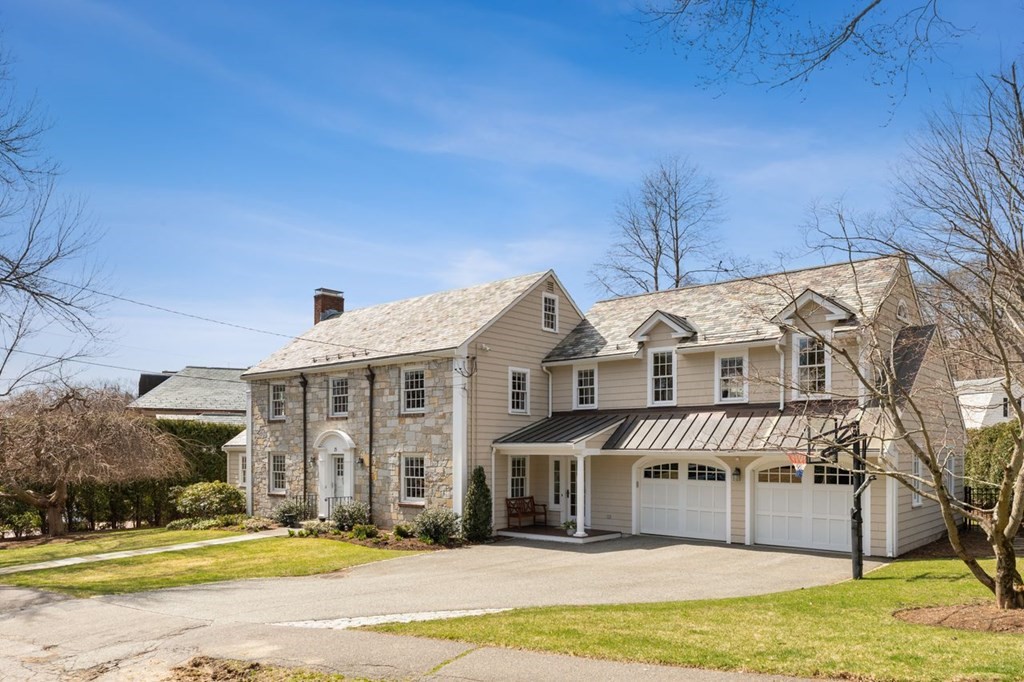15 Gould Road Newton, MA 02468 - Photo 2 of 33 a front view of a house with a yard