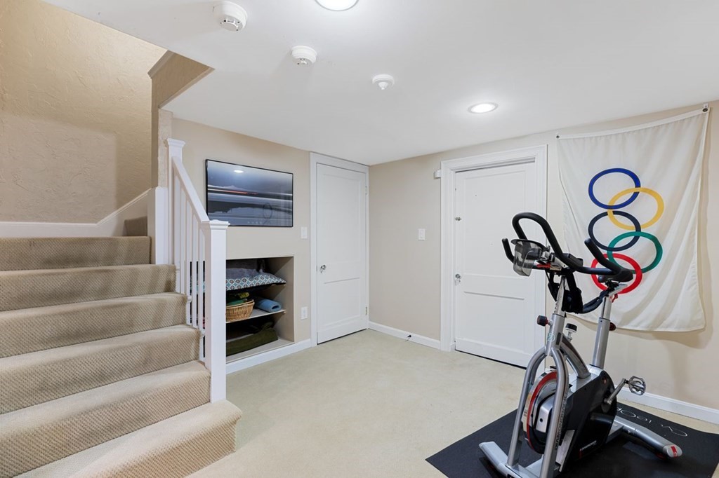 15 Gould Road Newton, MA 02468 - Photo 31 of 33 a view of a livingroom with furniture and staircase