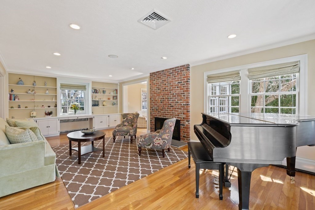 15 Gould Road Newton, MA 02468 - Photo 5 of 33 a living room with furniture floor to ceiling window and wooden floor