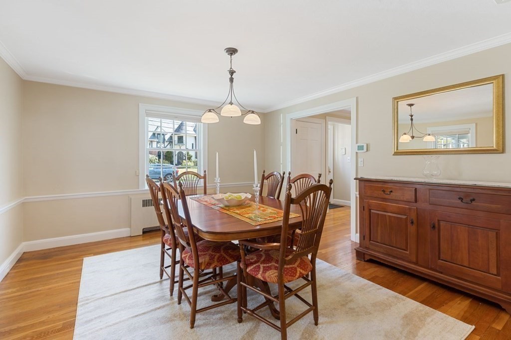 15 Gould Road Newton, MA 02468 - Photo 7 of 33 a view of a dining room with furniture window and wooden floor