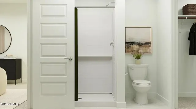 a bathroom with a toilet and a sink