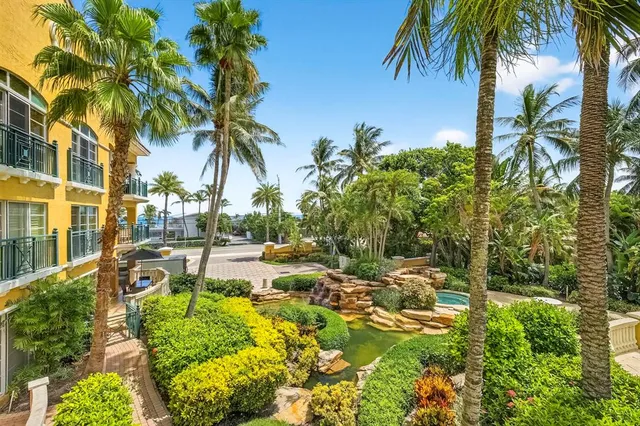 a view of a swimming pool with a garden