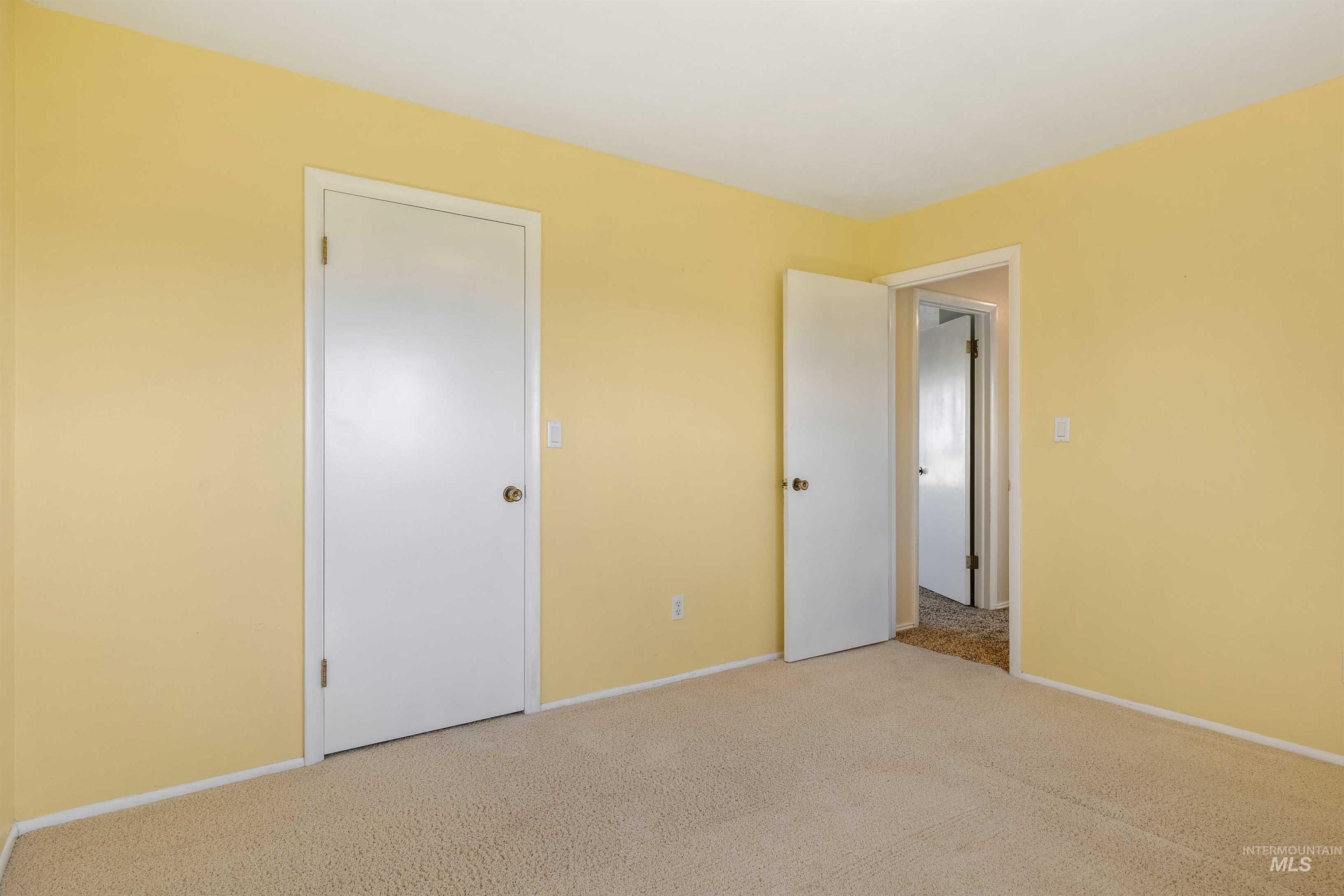 415 West 300 South Heyburn, ID 83336 - Photo 22 of 50 Unfurnished bedroom featuring carpet floors and baseboards