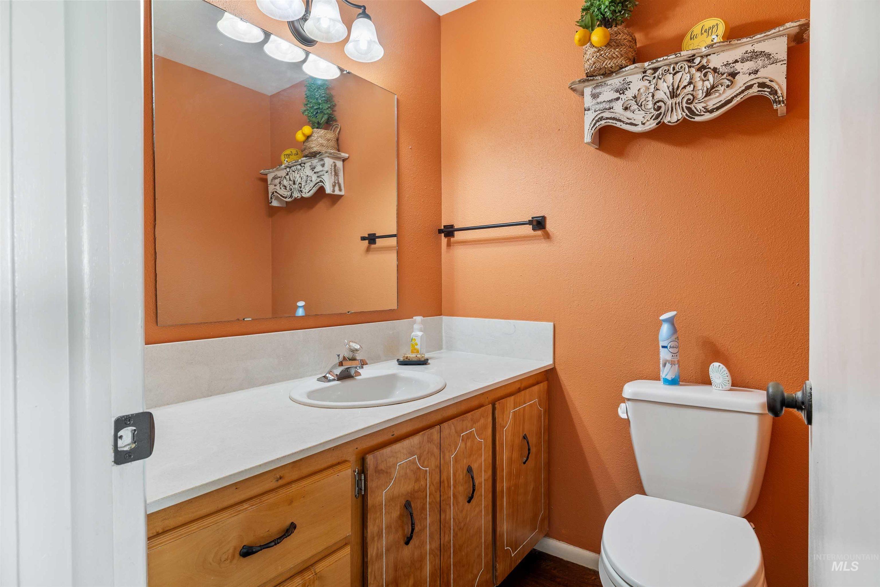 415 West 300 South Heyburn, ID 83336 - Photo 26 of 50 Half bathroom featuring vanity and a textured wall
