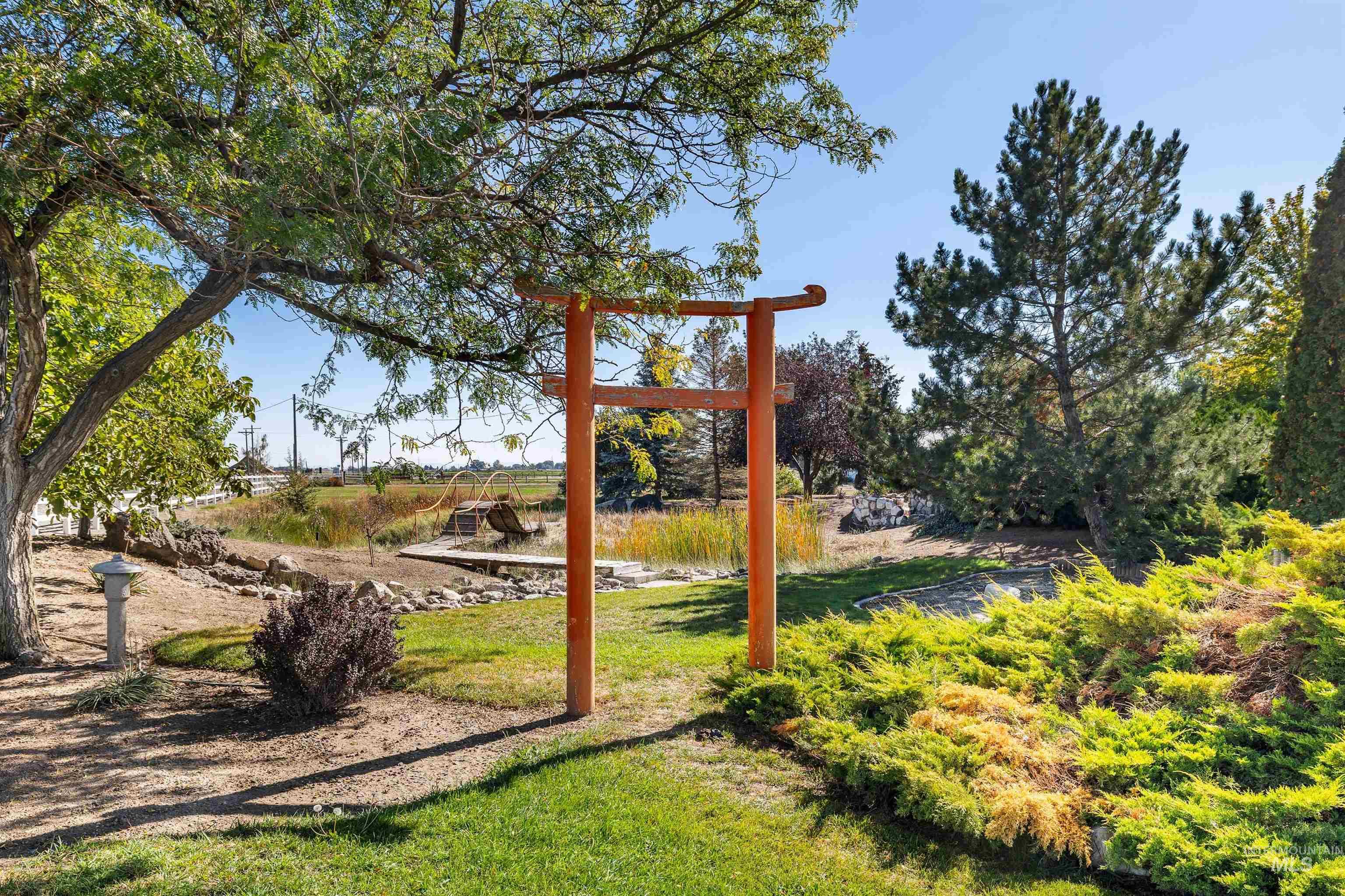 415 West 300 South Heyburn, ID 83336 - Photo 40 of 50 View of jungle gym featuring a lawn