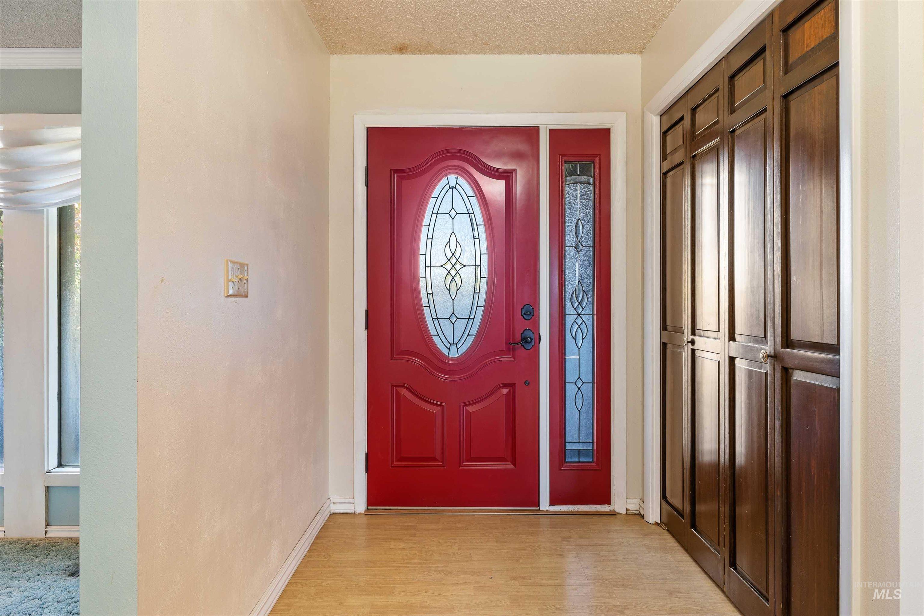 415 West 300 South Heyburn, ID 83336 - Photo 5 of 50 Foyer featuring a textured ceiling and light wood-style flooring