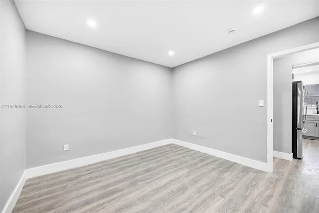 a picture of wall with door in it