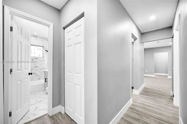 a kitchen with a sink stove and microwave