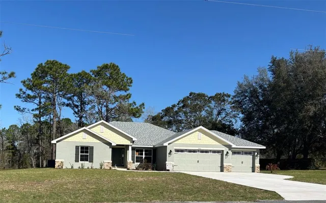 a house with trees in the background