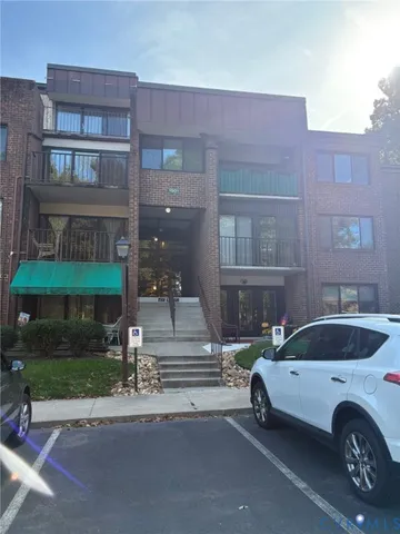 a car parked in front of a building