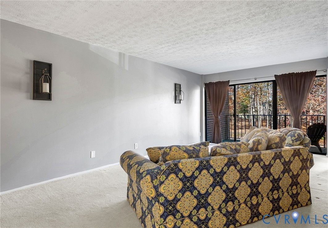 1501 Largo Road, Unit 201 Henrico, VA 23238 - Photo 13 of 31 a bedroom with bed and window