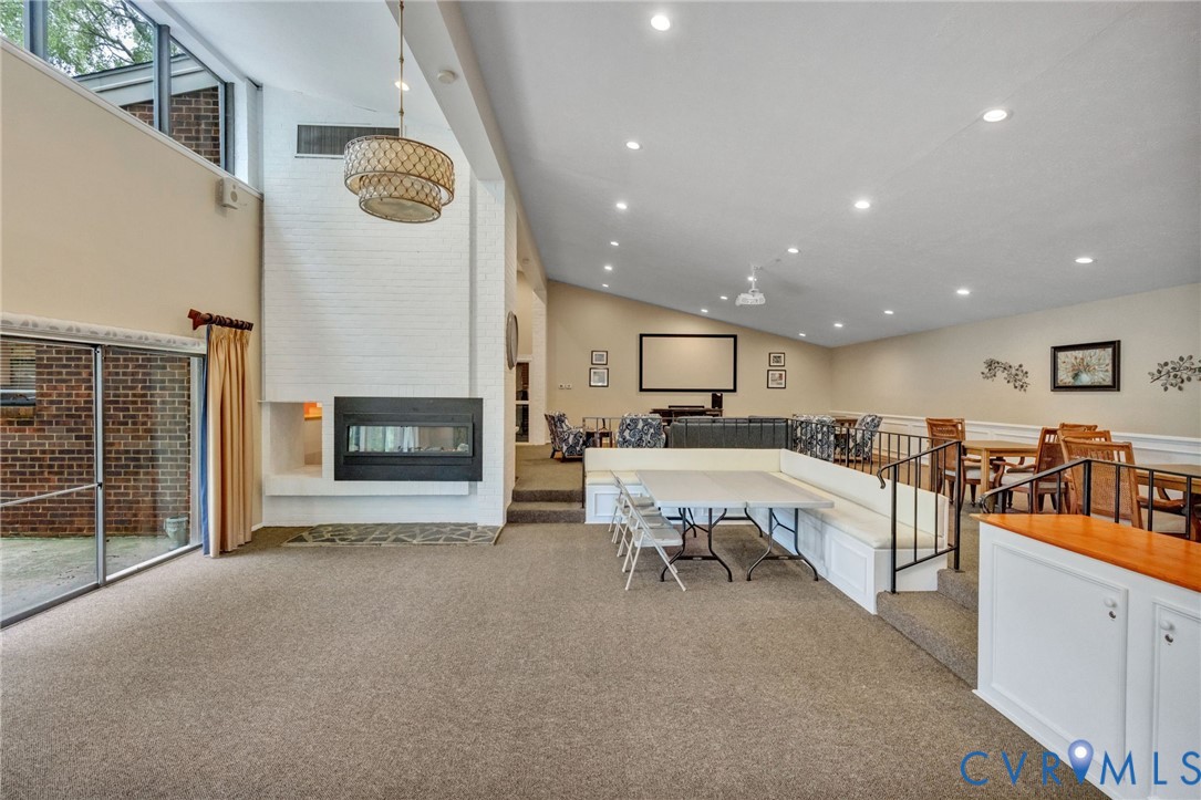 1501 Largo Road, Unit 201 Henrico, VA 23238 - Photo 30 of 31 a view of a kitchen with furniture and a fireplace
